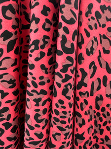 Fuchsia pink animal print stretch crepe, 100% poly, 150cm wide