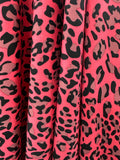 Fuchsia pink animal print stretch crepe, 100% poly, 150cm wide